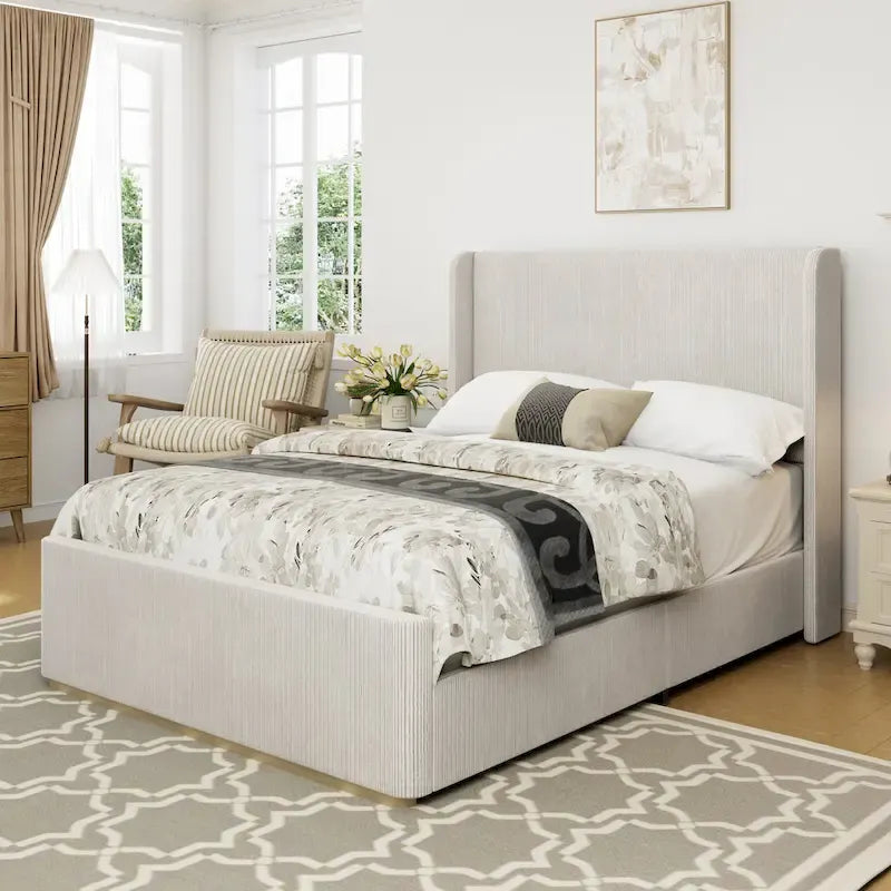 Cama de plataforma tapizada tamaño King de pana con cabecero alto con alas