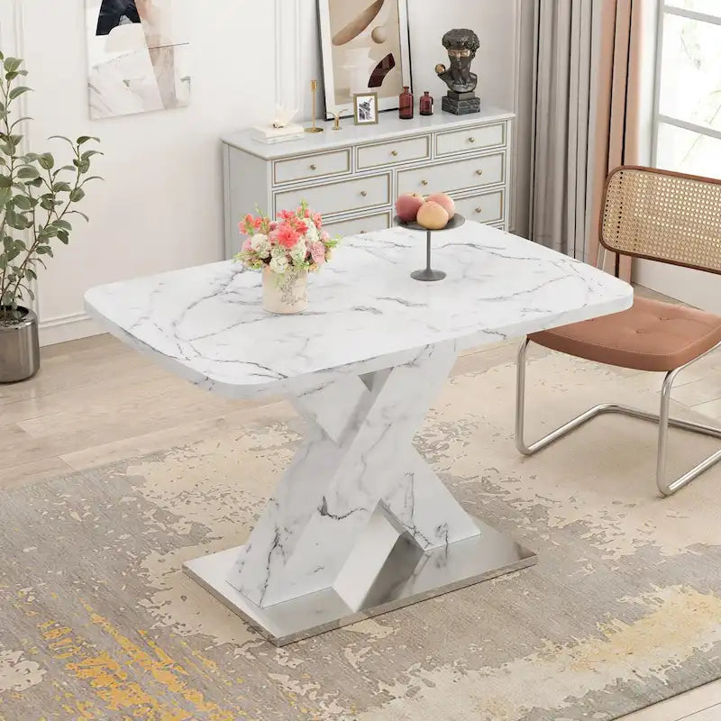 Mesa de comedor extensible con aspecto de mármol y pedestal en forma de X