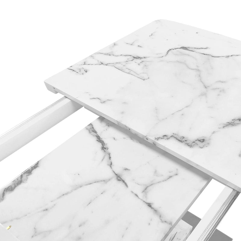 Mesa de comedor extensible con aspecto de mármol y pedestal en forma de X