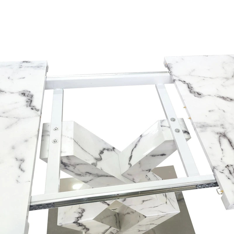 Mesa de comedor extensible con aspecto de mármol y pedestal en forma de X